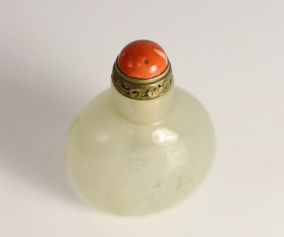 A Chinese agate ‘boys’ snuff bottle, 19th century 5.5cm high, brass and coral stopper